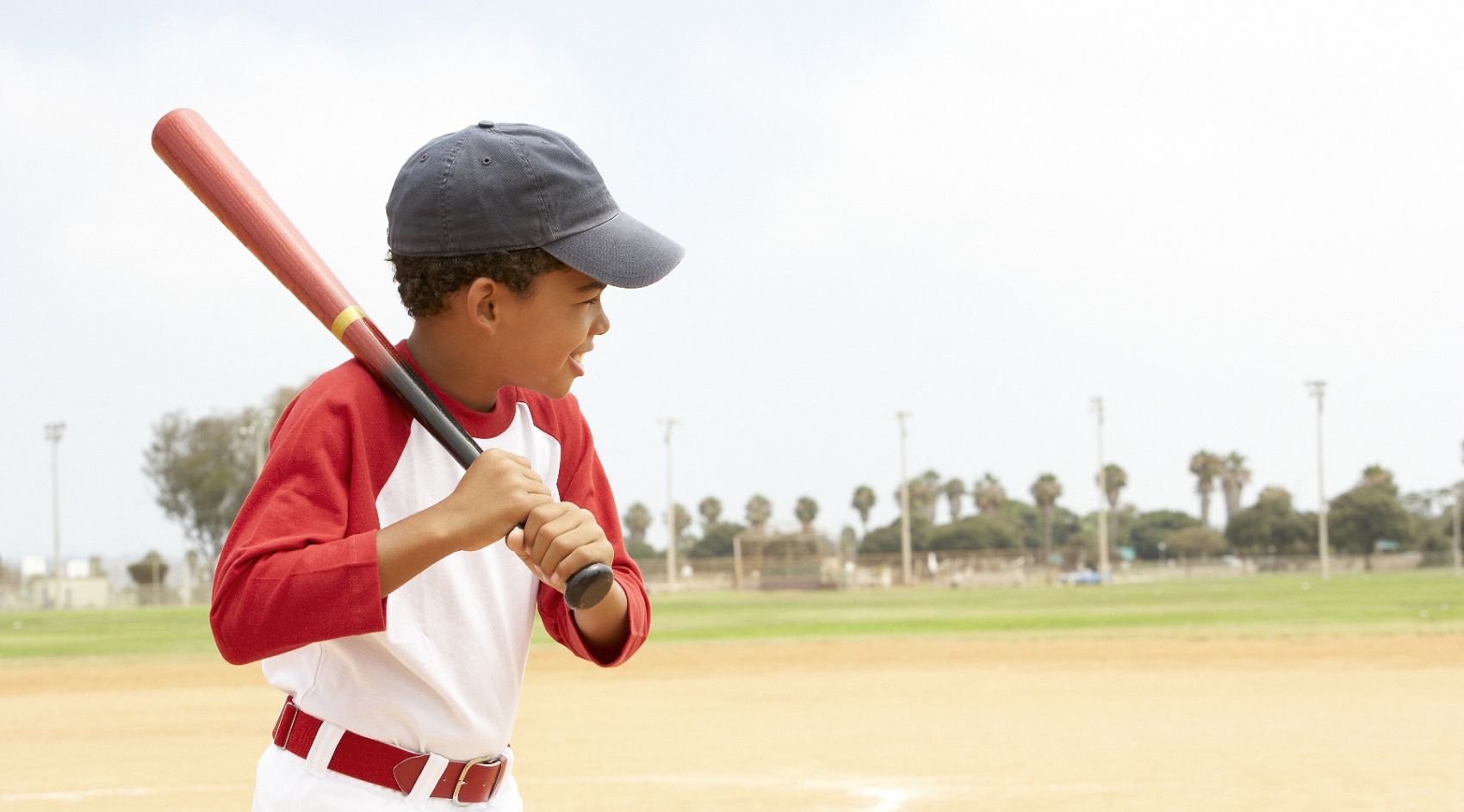 black child playing baseball